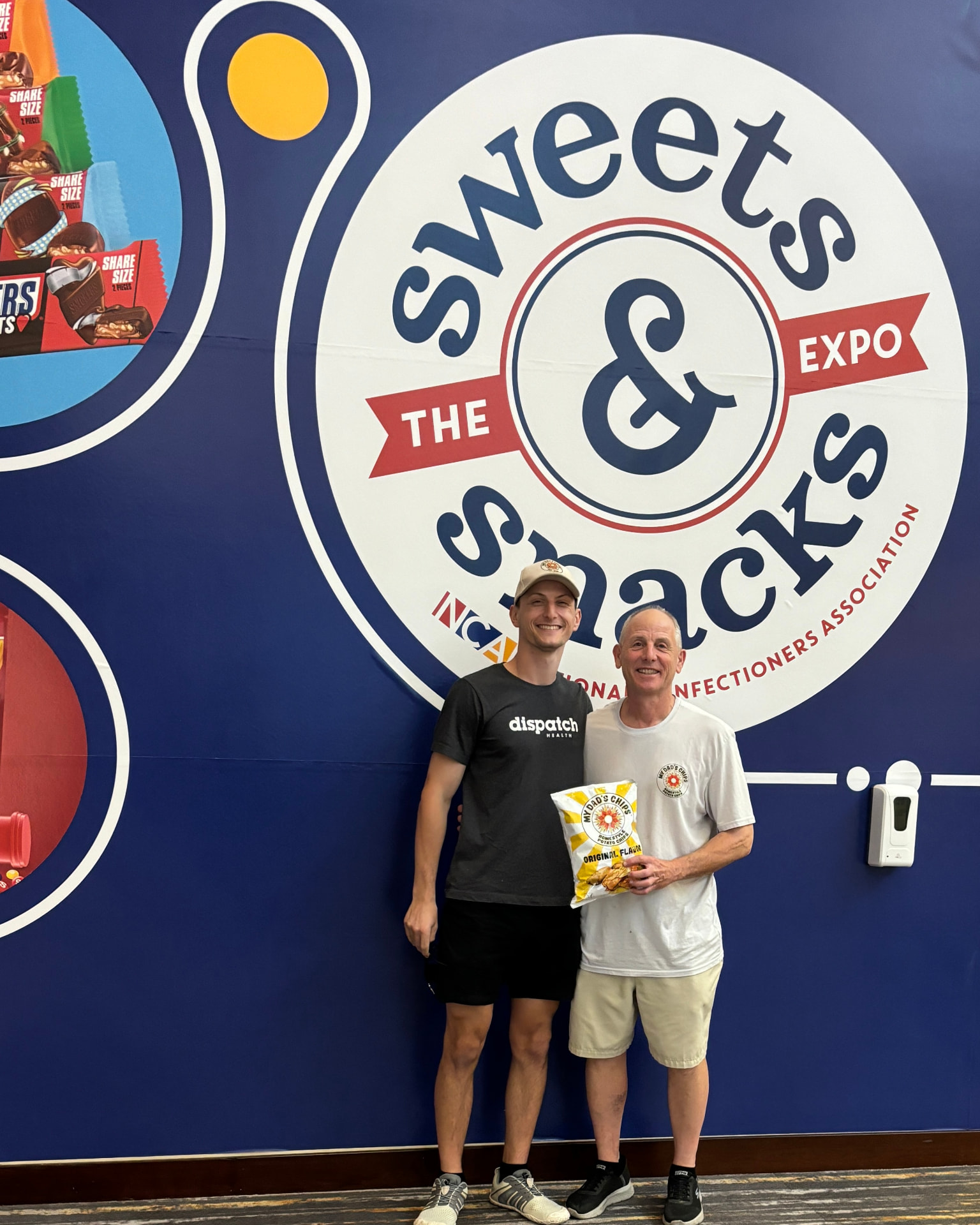 Brian and Gary with a bag of Original flavor chips at the Sweets & Snacks Expo.